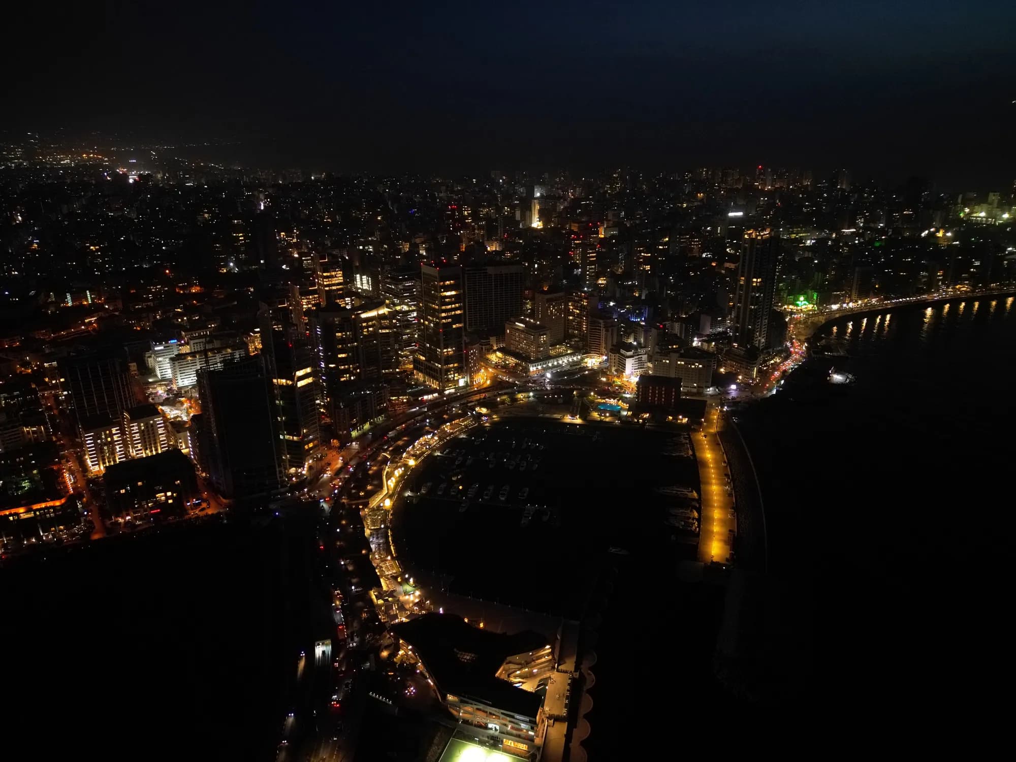 Aerial night view of the Beirut coastline and marina